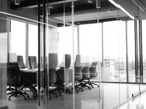 A full height glass partition used to create an office space.